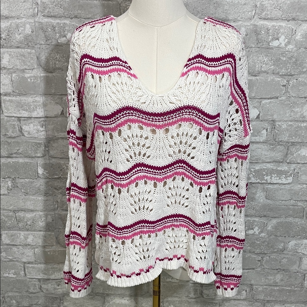 LOFT Wavy Stitch Swingy V-Neck Sweater in pink and white stripes.